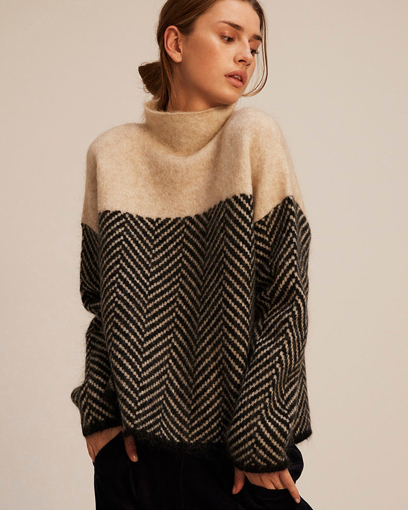 "Norah | Maglione in Cotone con Collo Alto" can be rewritten as "Norah | Maglione in Cotone con Collo Alto Elegante".