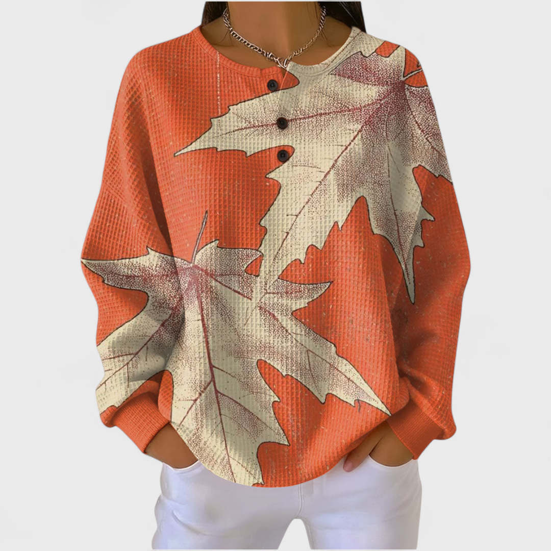 Manon - Pullover arancione con design foglia autunnale