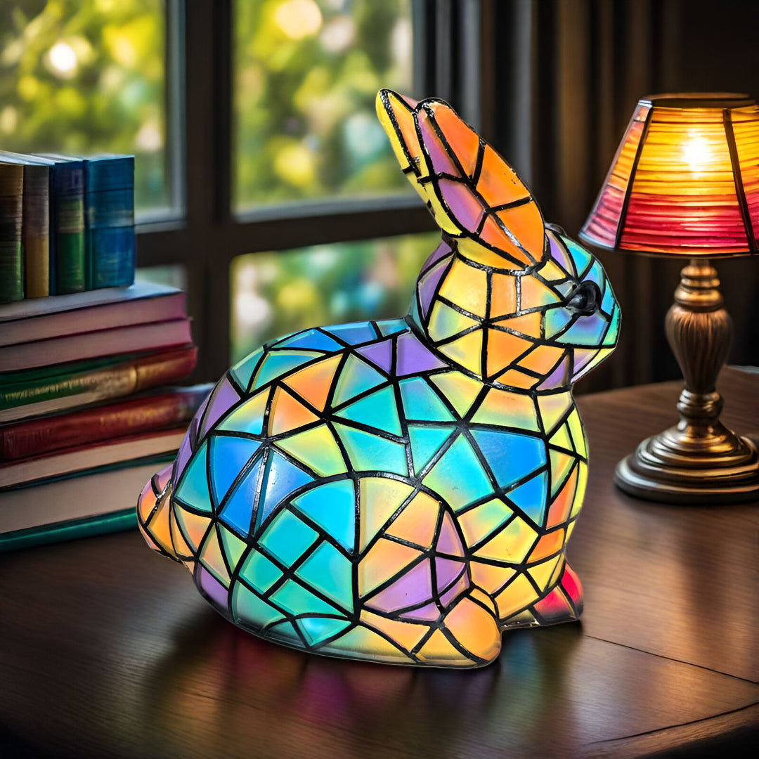 "Tibbe | Lampada Colorata a Forma di Coniglio" could be rewritten as "Tibbe | Lampada a Forma di Coniglio in Vari Colori".
